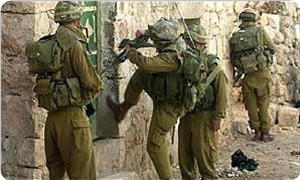 IOF troops storm homes of two martyrs, kill Palestinian teen