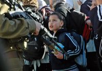 IOF soldiers quell Palestinian schoolchildren