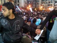 Muslims and Christians United in the Battle for Tahrir Square