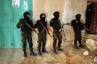 IOF troops round 10 Palestinians, IOA cuts water supplies to Palestinian village