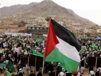Demonstrators block Route 60 near Beit Ummar