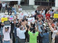 Website workers defiant after boss dismissed