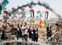 IOF soldiers quell peaceful Palestinian march